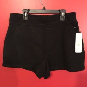 Brand new black shorts with pockets